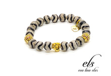 Load image into Gallery viewer, Striped multi-colored fist bracelet
